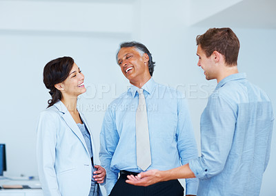 Buy stock photo Portrait of successful business people having a happy conversation with each other in office