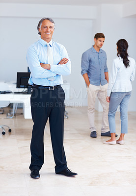 Buy stock photo Portrait, mature businessman with arms crossed for leadership, smile and management in office. Male CEO, happy boss and pride for corporate career, professional and executive manager for startup