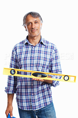Buy stock photo Male construction worker with spirit-level on a white background