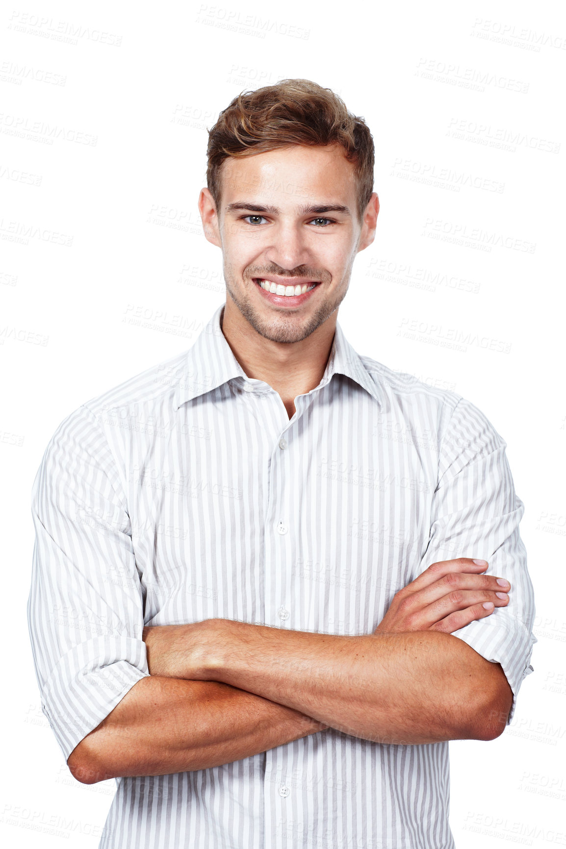 Buy stock photo Portrait of a proud, confident man with arms crossed isolated on white with copyspace. Happy young man smiling while looking satisfied, successful and powerful. Ambitious guy positive and charming 