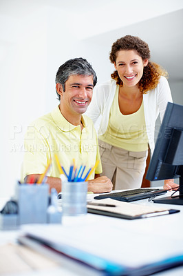 Buy stock photo Portrait of two business people smiling at work