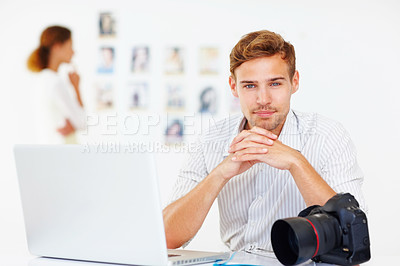 Buy stock photo Confident, man and photographer with portrait in office, camera or laptop with catalog for research trend topic. Male visual artist, creative agency and online for project management or editing photo