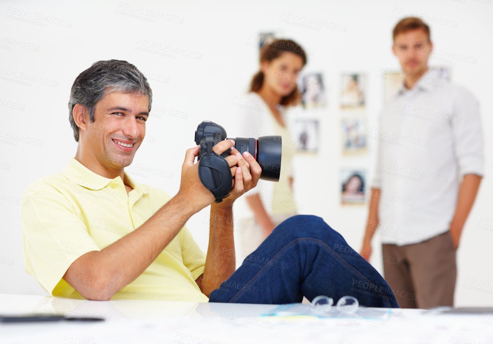 Buy stock photo Man, portrait and media photographer in office, review camera picture and creative business. Mature person, planning and feedback on lens in production, editing image and dslr equipment for shoot