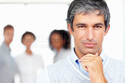 Buy stock photo Closeup portrait of confident business man with colleagues in background