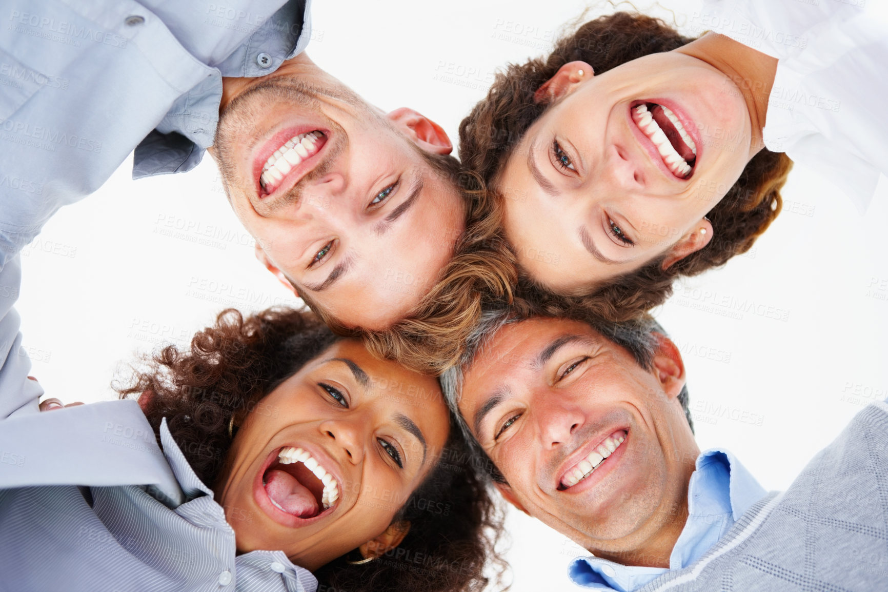 Buy stock photo Portrait, team building and happy business people in low angle for support, diversity and laughing for goal. Face, group and staff below in huddle for synergy, solidarity and cooperation of community