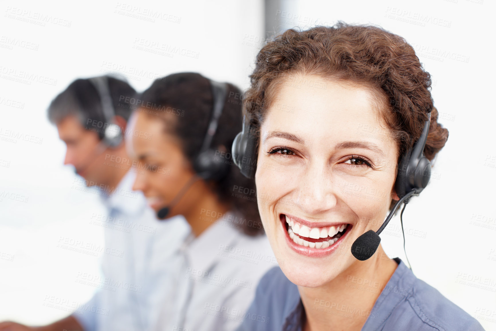 Buy stock photo Woman, portrait and happy in call center for customer service, contact us and CRM in office. Female consultant, face or headset at help desk with team, technical support or telemarketing with tech