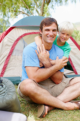 Buy stock photo Portrait, camping and father with son, hug and happiness with vacation, bonding together and smile. Face, family and single parent with boy, kid or fun with tent, nature and getaway trip with embrace