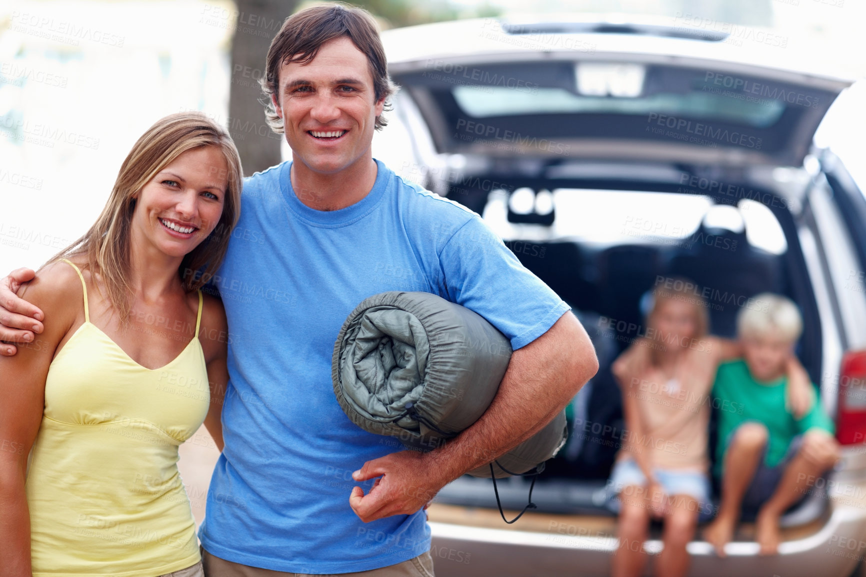 Buy stock photo Happy, man and woman with portrait for camp outdoor with family for adventure and weekend trip in mother nature. People, children and hug with smile in forest on summer holiday in wilderness together