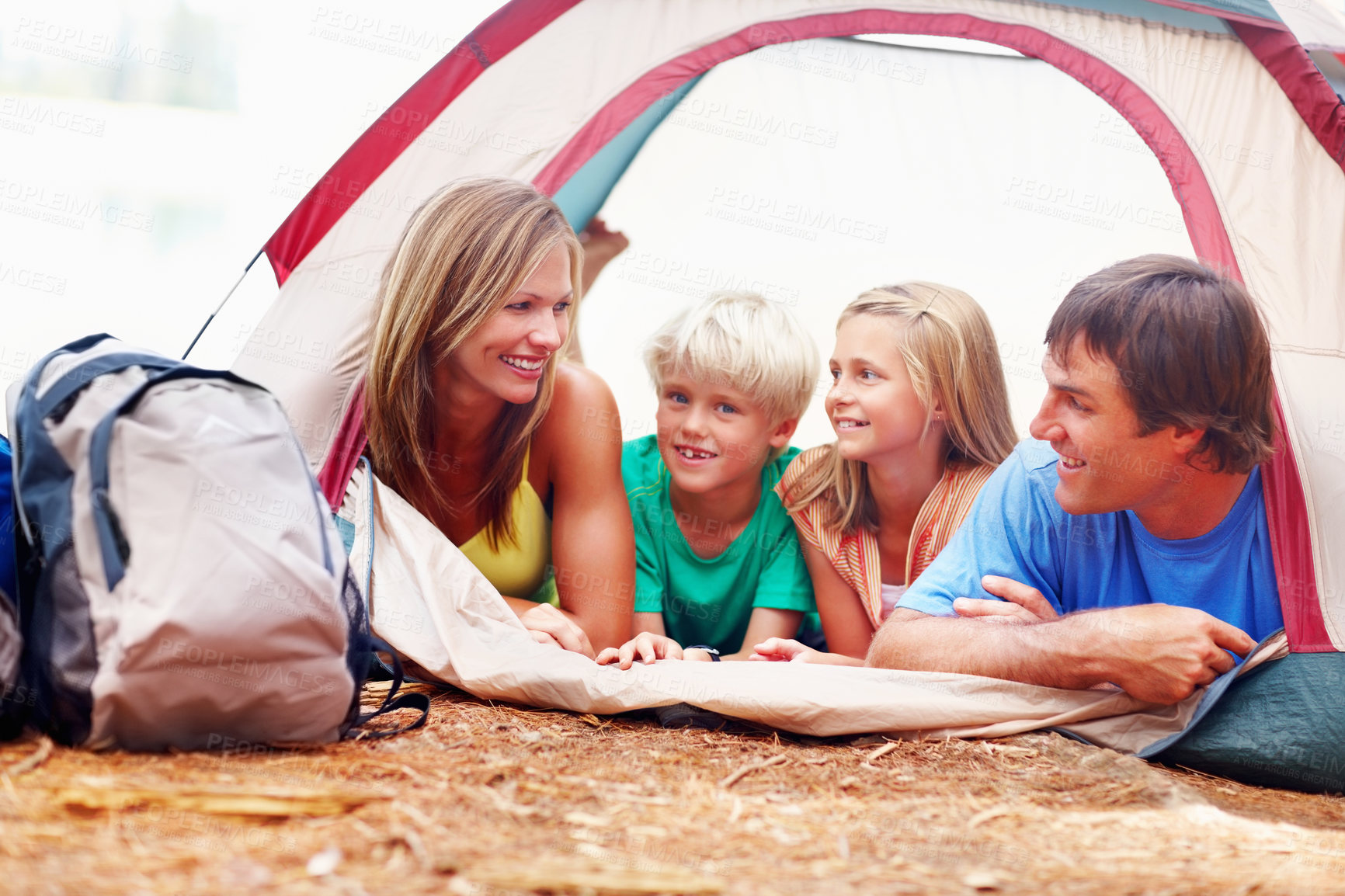 Buy stock photo Family, adventure and happy in nature for camping, vacation or excited for travel. Parents, kids and tent on campsite for holiday, development or journey in Germany for freedom on weekend summer trip