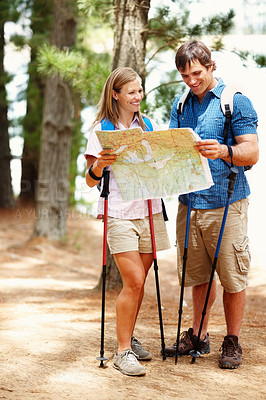 Buy stock photo Couple, hiking and gear with road map, path and nature for travel, adventure and forest. Happy people, journey and countryside for discovery, fitness and exploring for recreation, outdoor and sports