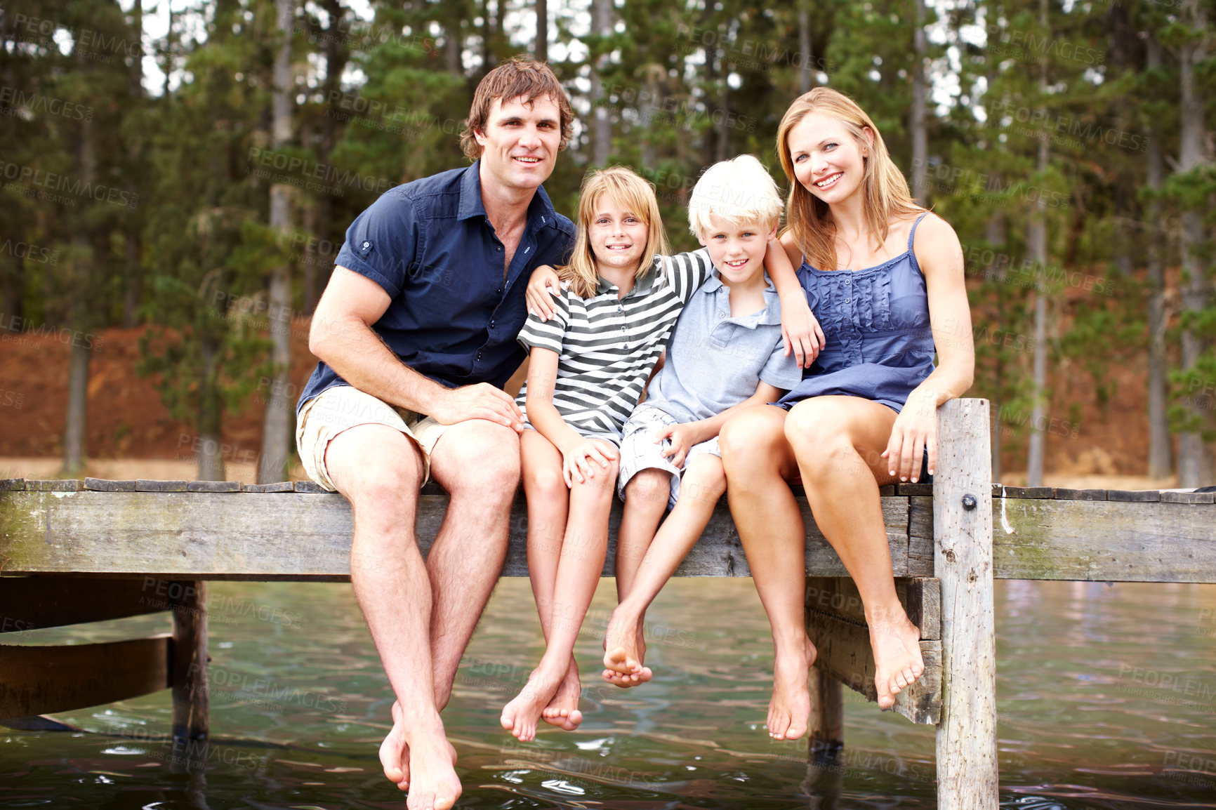 Buy stock photo Portrait, family and outdoor in nature, lake and holiday for parents and children, vacation and fun. Water, mom and dad with kids, bonding and travel to river for peace, man and woman with smile