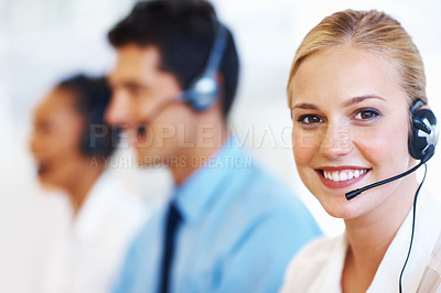 Buy stock photo Closeup of professional female operator smiling at call center