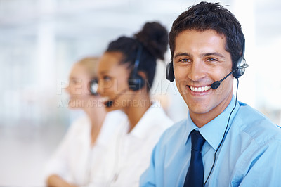 Buy stock photo Portrait of smiling male operator speaking on call with colleagues