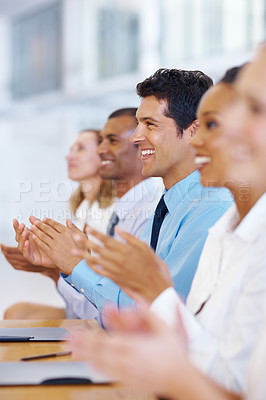 Buy stock photo Portrait of supportive business group clapping together after meeting
