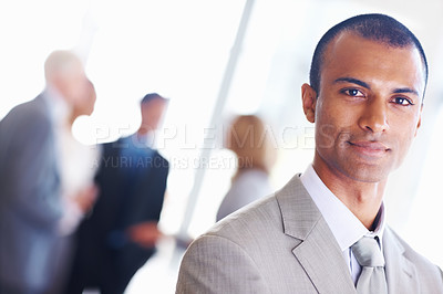 Buy stock photo Closeup of dedicated African American business man with executives in background