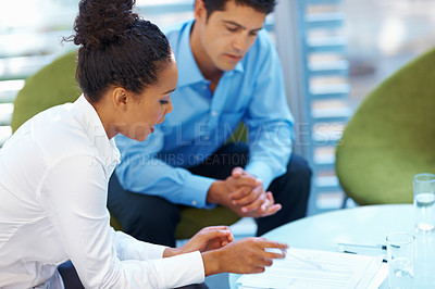 Buy stock photo Portrait of African American business woman in conversation with male executive at office
