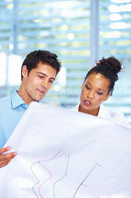 Buy stock photo Portrait of multi racial architects looking at blueprints
