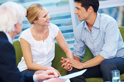 Buy stock photo Portrait of happy young couple in meeting with financial adviser