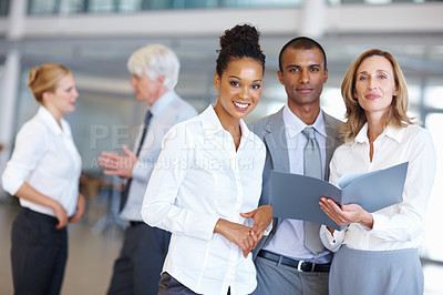 Buy stock photo Portrait of multi ethnic executives with documents at office