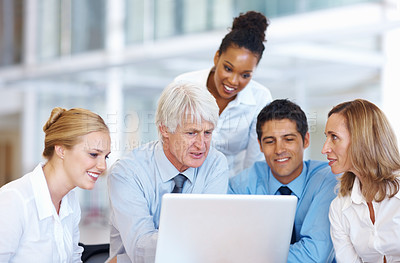 Buy stock photo Portrait of multi ethnic business people working on laptop together at office