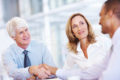 Buy stock photo Portrait of senior business man shaking hands with executive at office