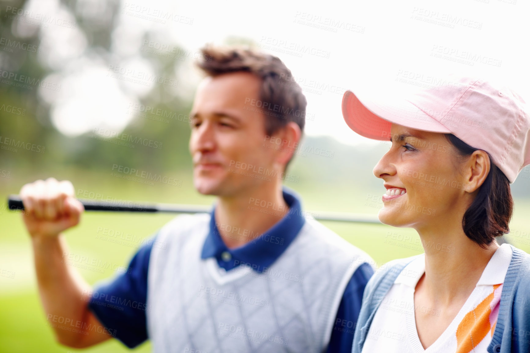 Buy stock photo Smile, love and face of couple on golf course for game, outdoor fun or fitness adventure on weekend morning. Nature, happy woman and man walking on field for sports date, health and exercise wellness