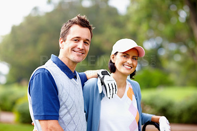 Buy stock photo Portrait of golfing couple giving you an attractive smile
