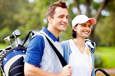 Buy stock photo Portrait of cute couple smiling with man holding a golf bag