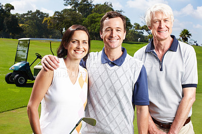 Buy stock photo Smiling golfing companions on the green with their golf cart in the background