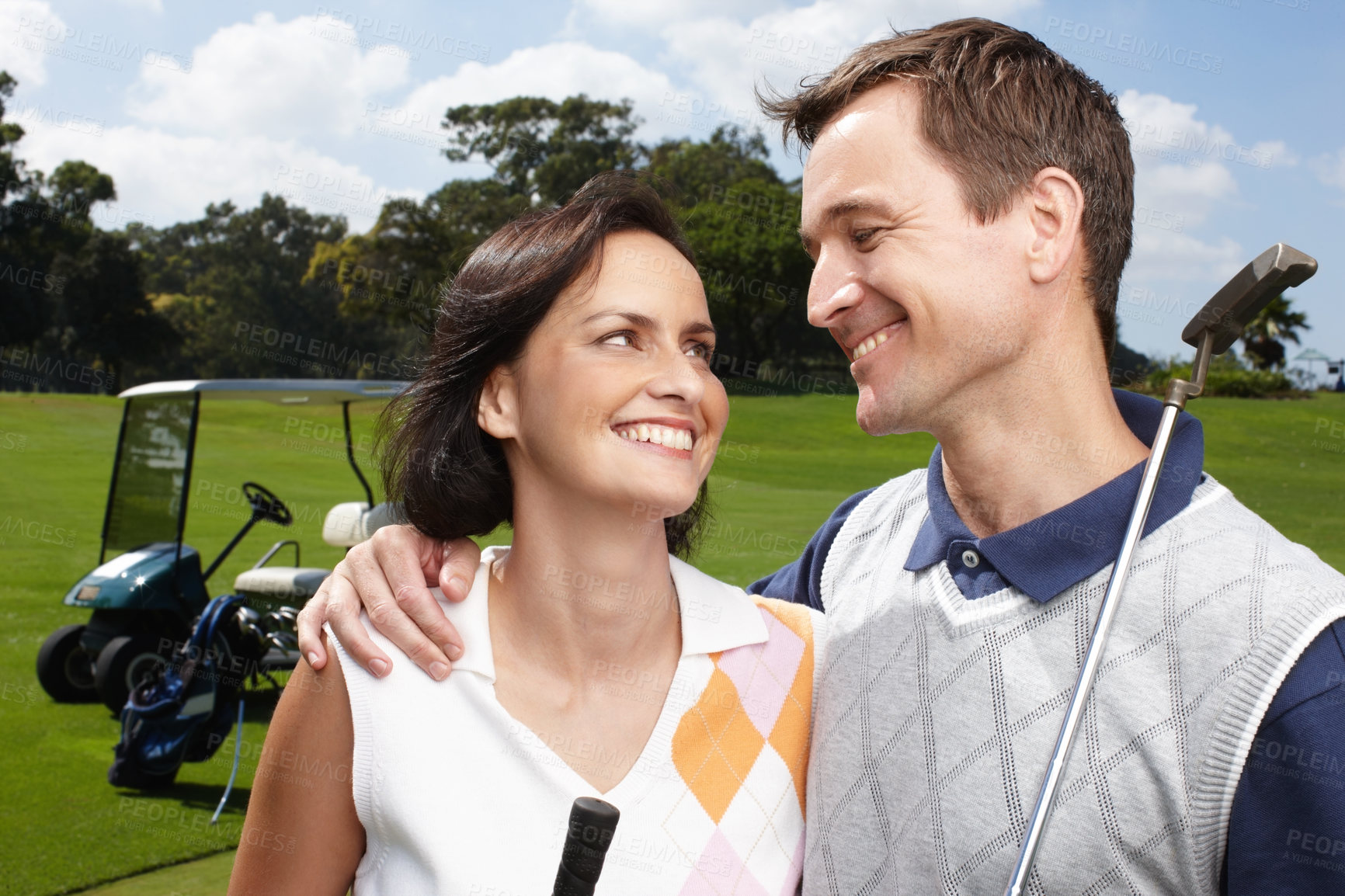 Buy stock photo Golf, support and couple on course with smile, outdoor fun and fitness on weekend morning together. Love, happy woman and man on green grass for romantic sports date, health and wellness in exercise.