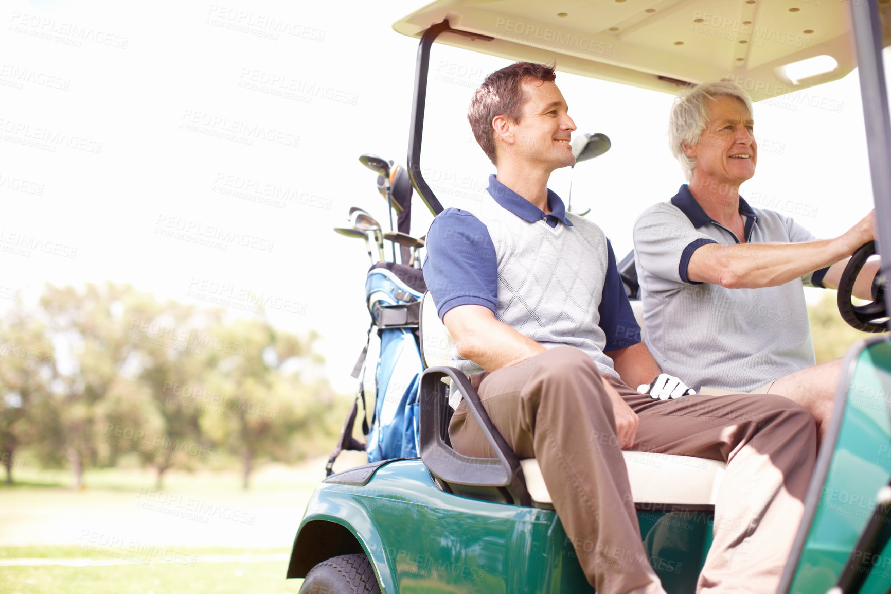 Buy stock photo Smile, drive and men in golf cart together for game, outdoor bonding and fitness on weekend morning. Love, senior dad and son in buggy for sports transport, health and wellness with fun exercise.