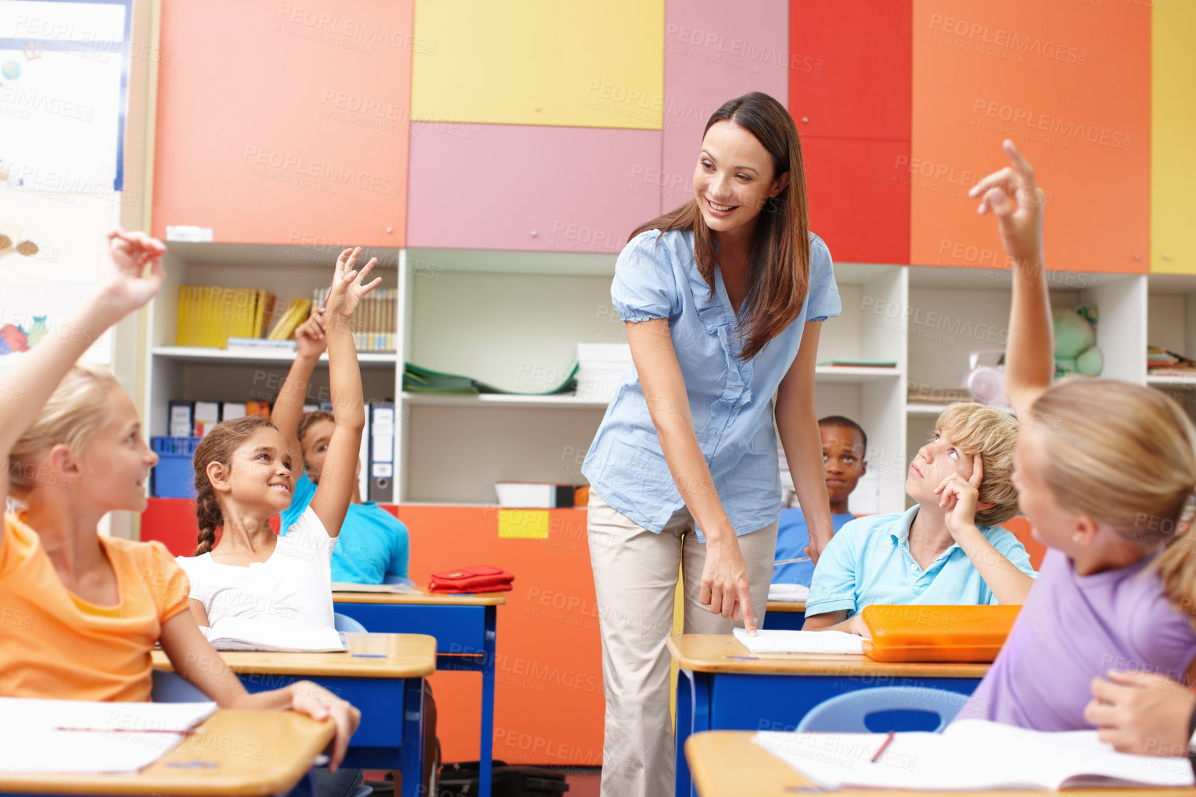 Buy stock photo Woman, question and children with hands raised at school for education, discussion and choice for answer. Happy, teacher and students with gesture in class for solution, participation and learning