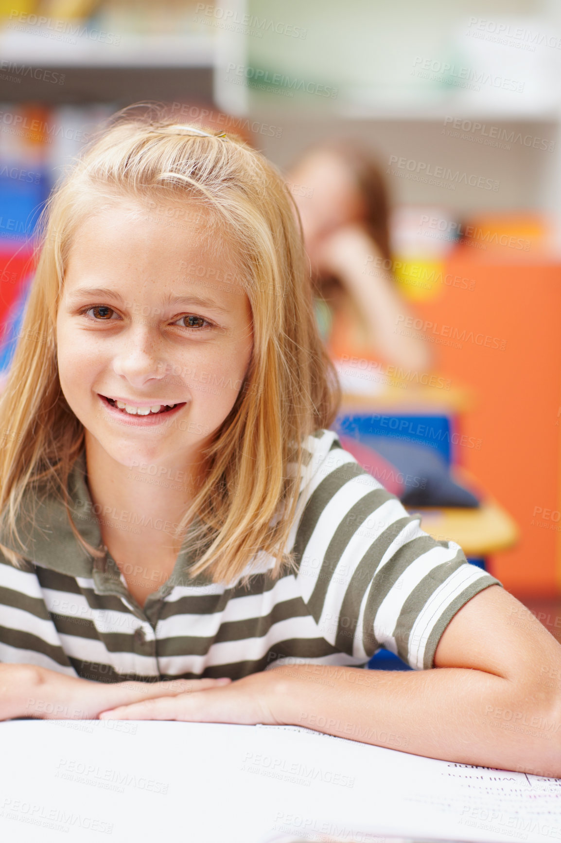 Buy stock photo Smile, face and girl in kids classroom for learning, growth and child development at elementary school. Happy, portrait and student at desk for education, study and future opportunity for scholarship