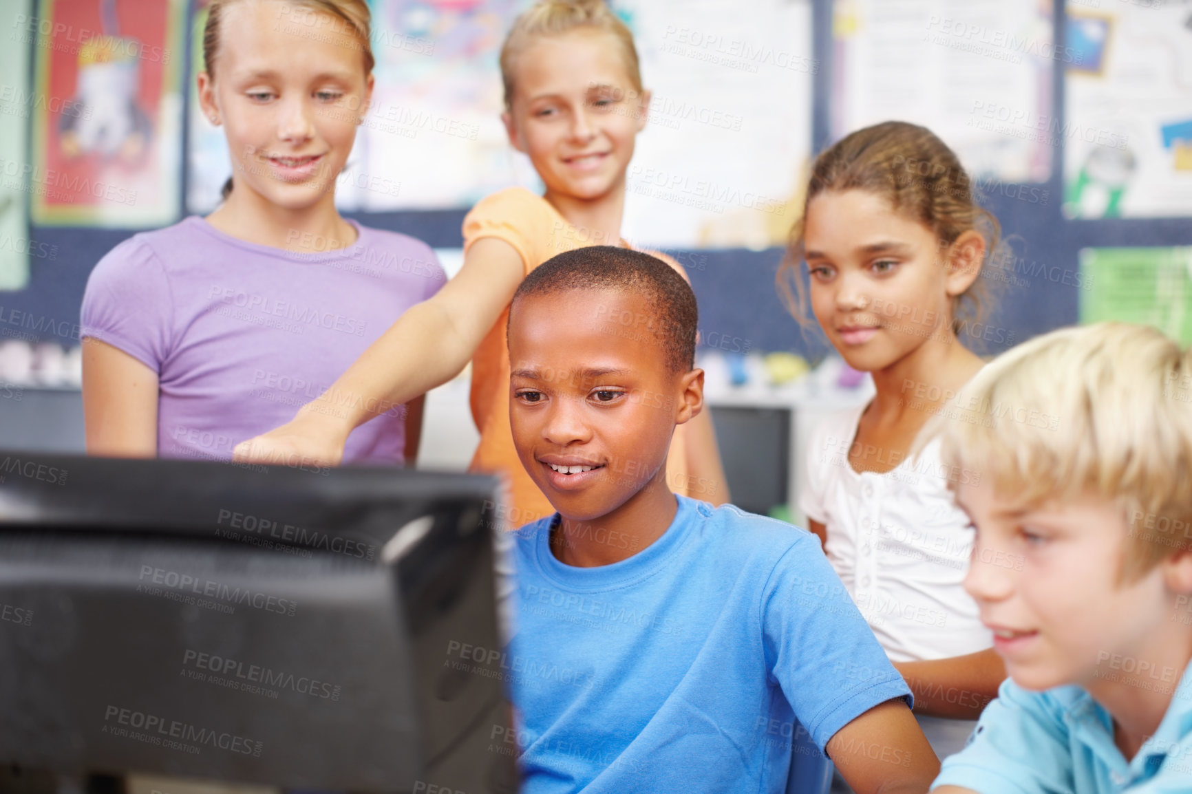 Buy stock photo Kids, students and happy in classroom on computer with group work or activity for education. People, classmates and smile as pupil at elementary school with assignment for brain development or growth