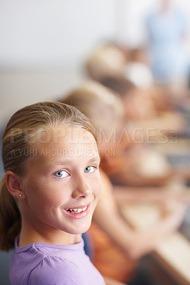 Buy stock photo Portrait of a young schoolgirl in computer class