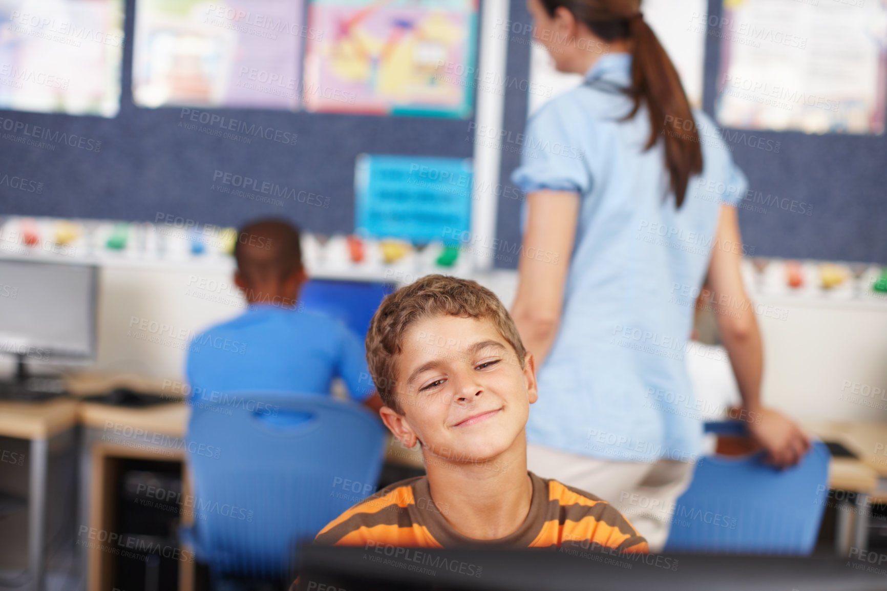 Buy stock photo Children, computer and education with student boy in classroom of school for learning or online study. Development, research and smile with student kid in class for future, growth or scholarship