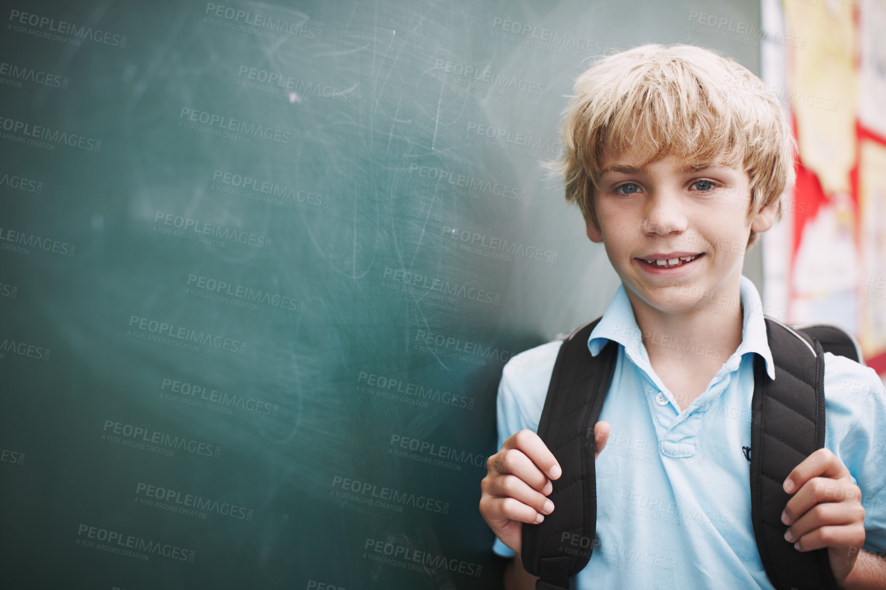 Buy stock photo Backpack, chalkboard and portrait of happy boy in classroom at school for development or education. Learning, smile and study with student on mockup space in class for future, growth or scholarship