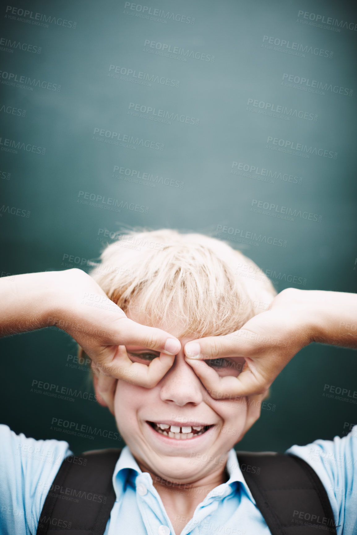 Buy stock photo Chalkboard, finger glasses and portrait of boy in classroom at school for development or education. Funny face, smile and study with student on mockup space in class for future, growth or scholarship