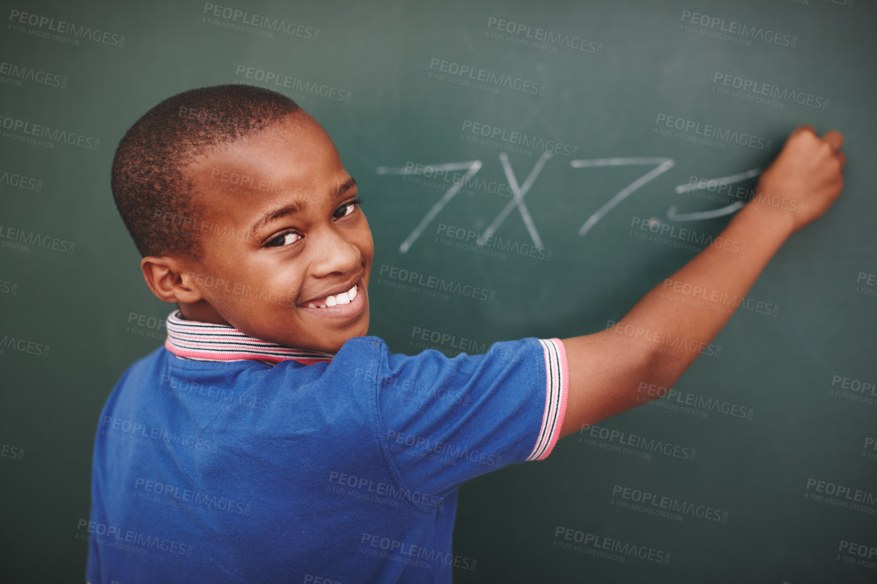 Buy stock photo Math, student and portrait at chalkboard in classroom with problem solving, education or learning development. Scholarship, black boy or answer question with multiplication or number lesson at school