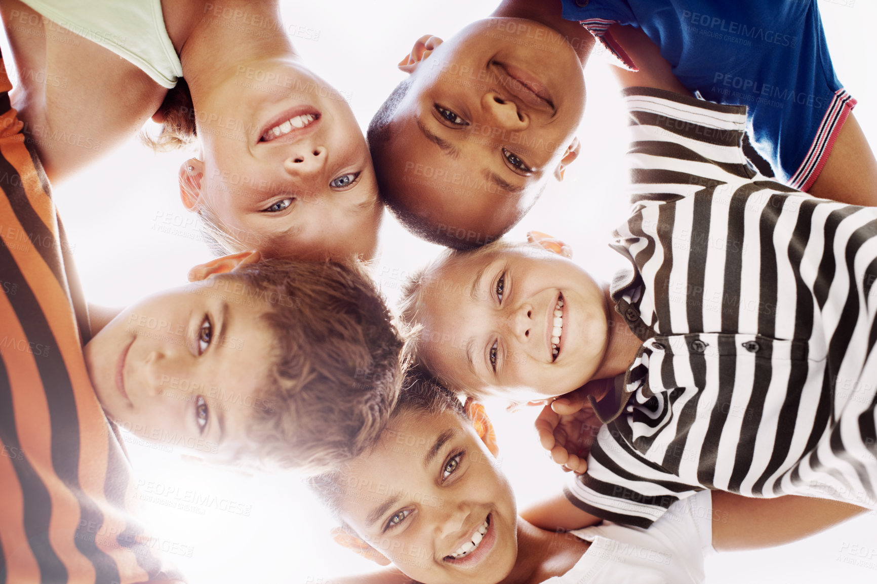 Buy stock photo Education, huddle and portrait of children friends outdoor at school together for development. Diversity, scholarship or smile with boy and girl students in circle for bonding, learning or study