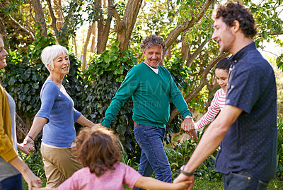 Buy stock photo Happy family, holding hands and dance in circle outdoor or play game in summer together with grandparents. Ring a rosy, smile and kids in garden on holiday, vacation or bonding with parents in nature