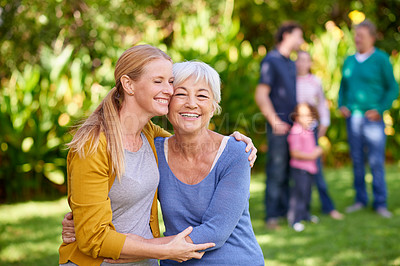 Buy stock photo Family, mother and adult daughter hug in park, spending quality time in outdoor together with happiness and care. Happy women are content in relationship with love, bonding and carefree in nature