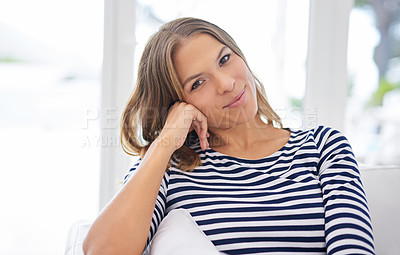 Buy stock photo Portrait, house and woman on sofa, comfort and happiness with weekend break, relax and peaceful. Face, apartment and cheerful person on couch, girl and joyful with wellness, calm or resting in lounge