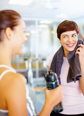 Buy stock photo Fitness woman with friend enjoying time together after a workout