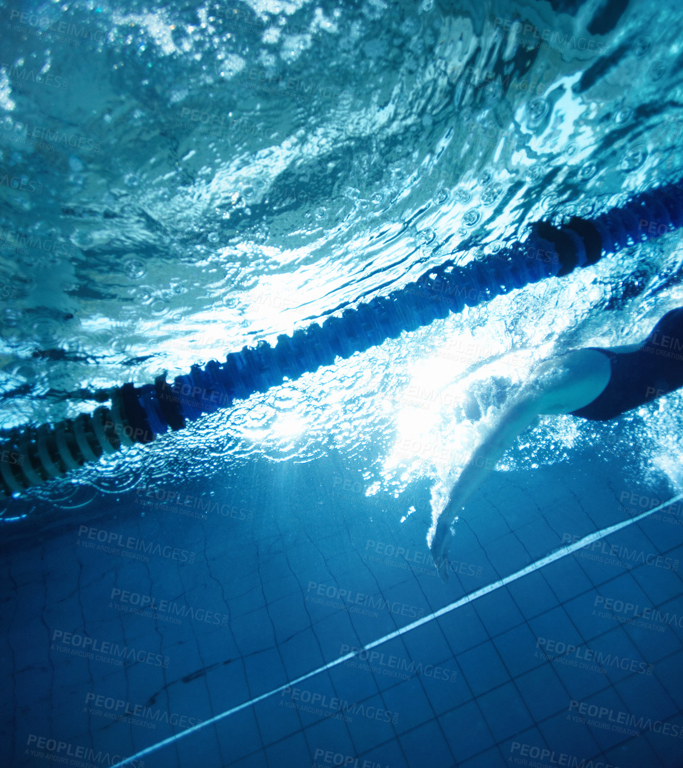 Buy stock photo Underwater, exercise and person in swimming pool, blue and training for competition, cardio and athlete. Lines, clean and aquatic sports, recreational and liquid for race, rope and arena for games