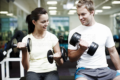 Buy stock photo Couple, smile and exercise with weights in gym for bodybuilding, fitness and training together. Man, woman and happy with equipment in health club for strength workout, support or teamwork in morning