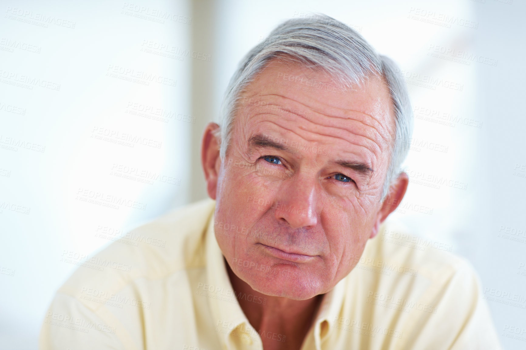 Buy stock photo Home, senior man and portrait on sofa for brainstorming, memory and thoughts in retirement on couch. Mockup space, male person and serious with ideas for decision, choice and thinking in living room