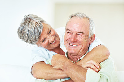 Buy stock photo Closeup of happy mature woman embracing cheerful man at home
