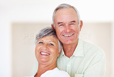 Buy stock photo Closeup portrait of loving mature couple smiling together