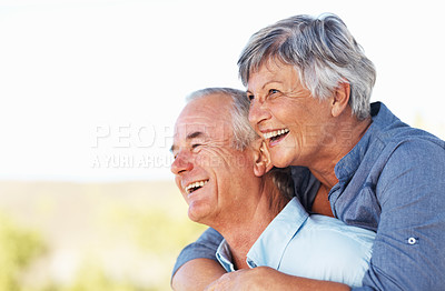 Buy stock photo Closeup of smiling mature woman embracing man outdoors